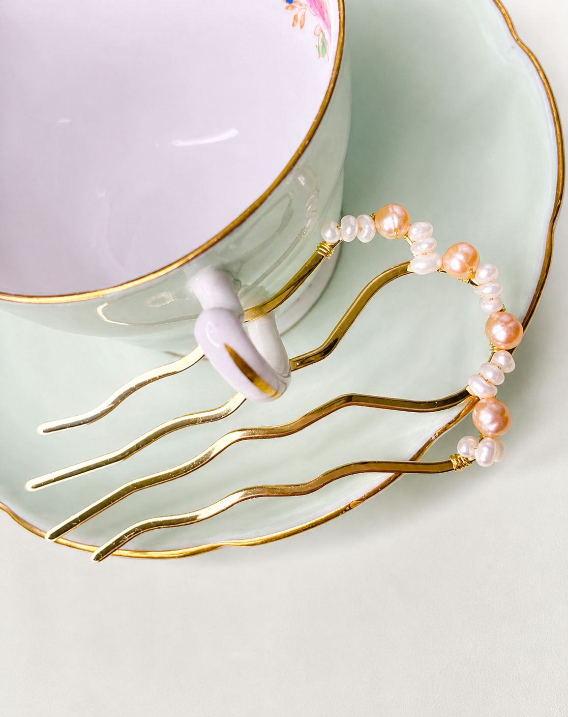 Large French hair pin featuring pink and white freshwater pearls